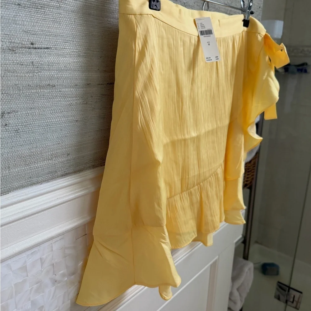 NWT new medium Anthropologie Maeve ruffle mini skirt yellow wrap tie